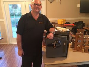 Terry Whin-Yates demostrating in Calgary Alberta how to open a Sentry Safe in seconds.
